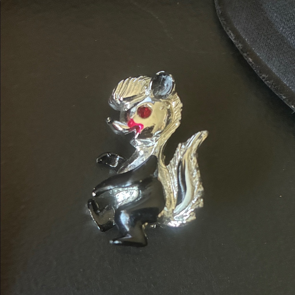 Vintage Black and Silver Skunk Pin with Red Accent